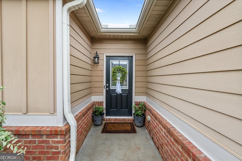 Welcome to this charming 3-bedroom, 2-bath ranch located in an - photo 7