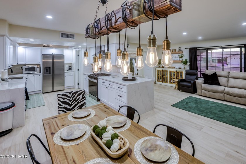 Completely remodeled and loaded with upgrades, this stunning 3 - photo 12