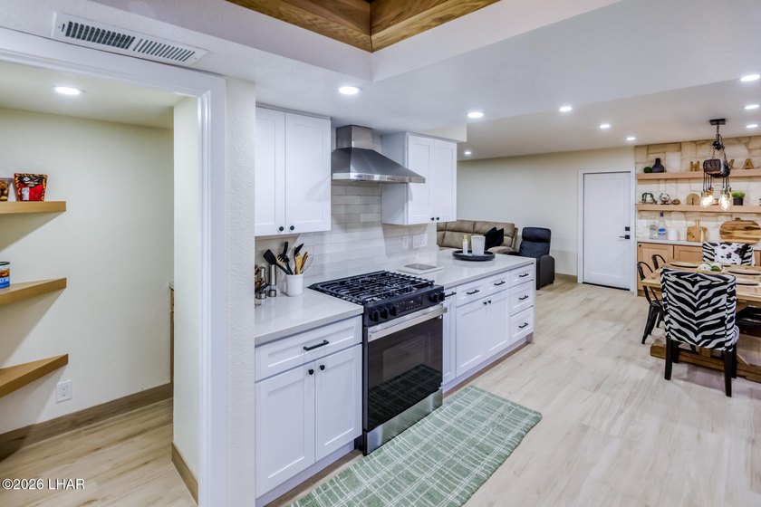 Completely remodeled and loaded with upgrades, this stunning 3 - photo 16