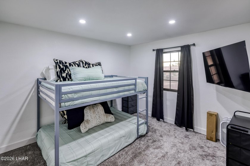 Completely remodeled and loaded with upgrades, this stunning 3 - photo 21