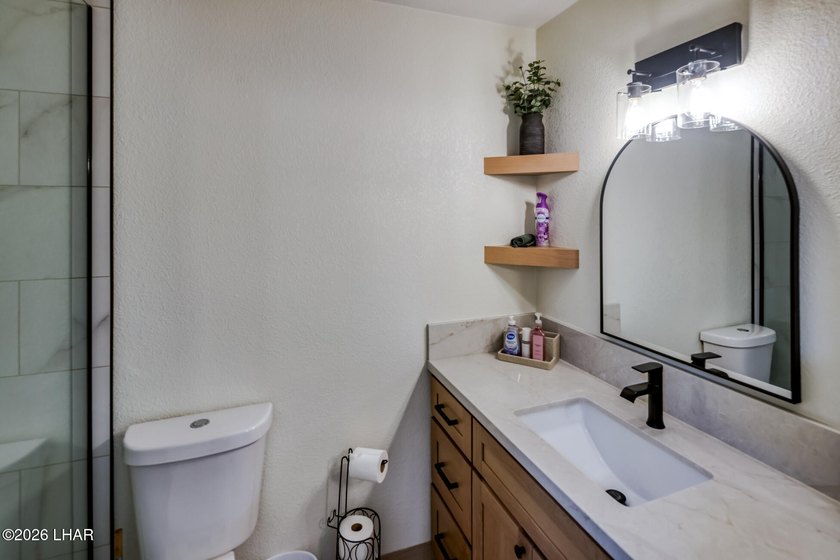 Completely remodeled and loaded with upgrades, this stunning 3 - photo 22