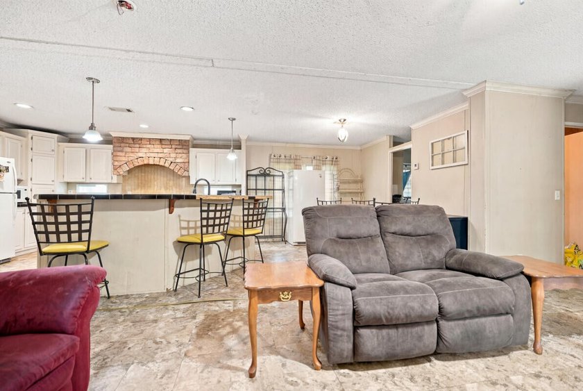 This spacious 3-bedroom, 2-bathroom home offers a bright - photo 7