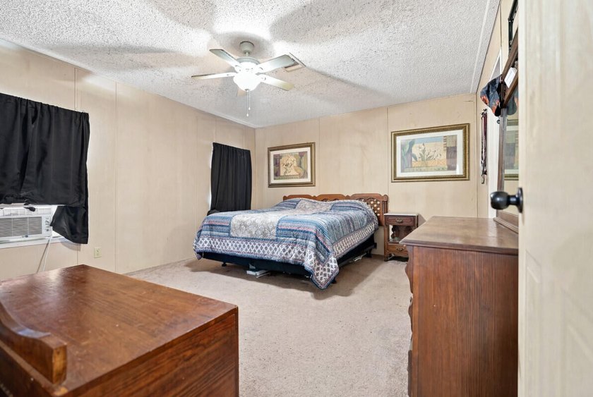 This spacious 3-bedroom, 2-bathroom home offers a bright - photo 8