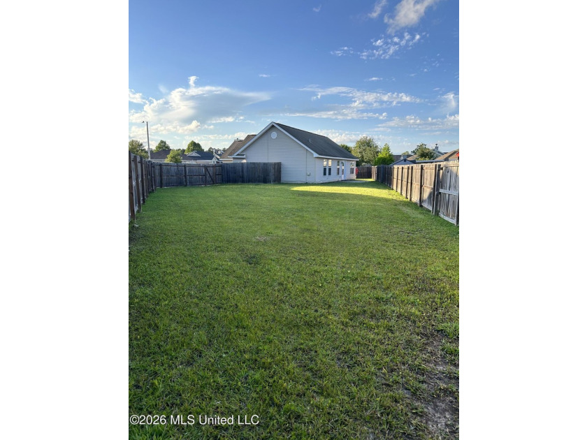 Super cute and super clean! This charming home sits on a large - photo 13
