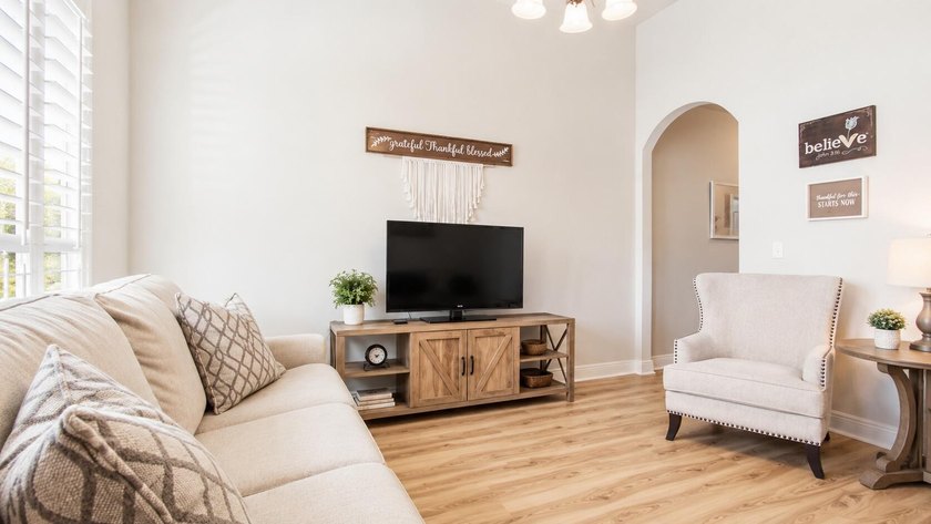 Experience luxurious pond-front living in this beautifully - photo 3
