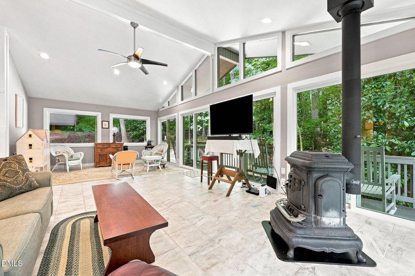 Set on two lots totaling 1.3 acres with panoramic views of the - photo 23