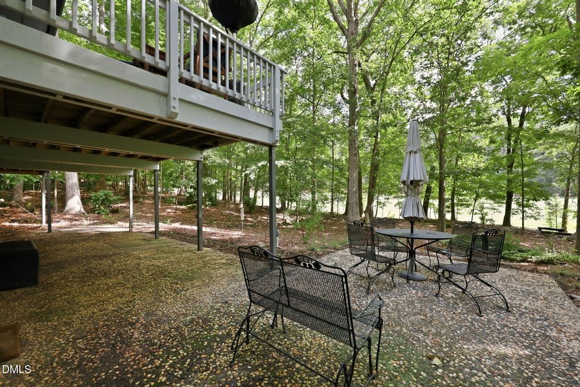 Set on two lots totaling 1.3 acres with panoramic views of the - photo 44
