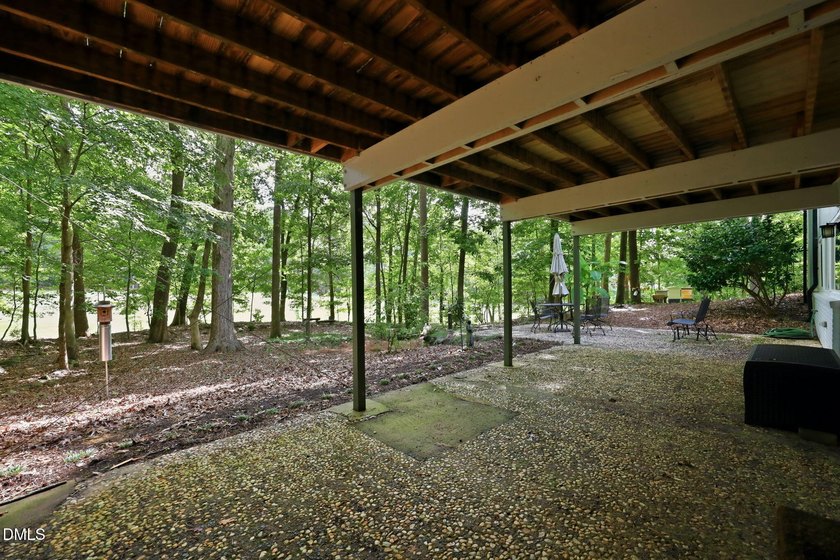 Set on two lots totaling 1.3 acres with panoramic views of the - photo 45
