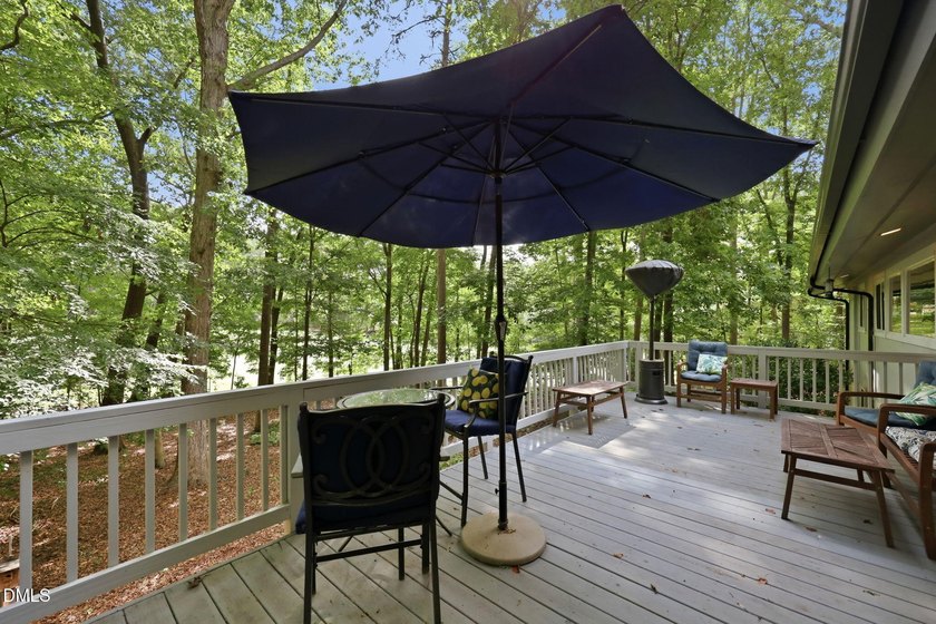 Set on two lots totaling 1.3 acres with panoramic views of the - photo 48