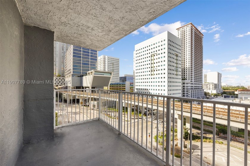 Sleek city living meets unmatched convenience in this updated - photo 8
