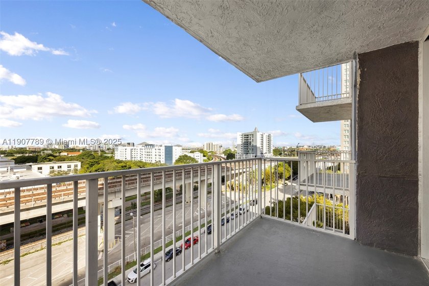 Sleek city living meets unmatched convenience in this updated - photo 9