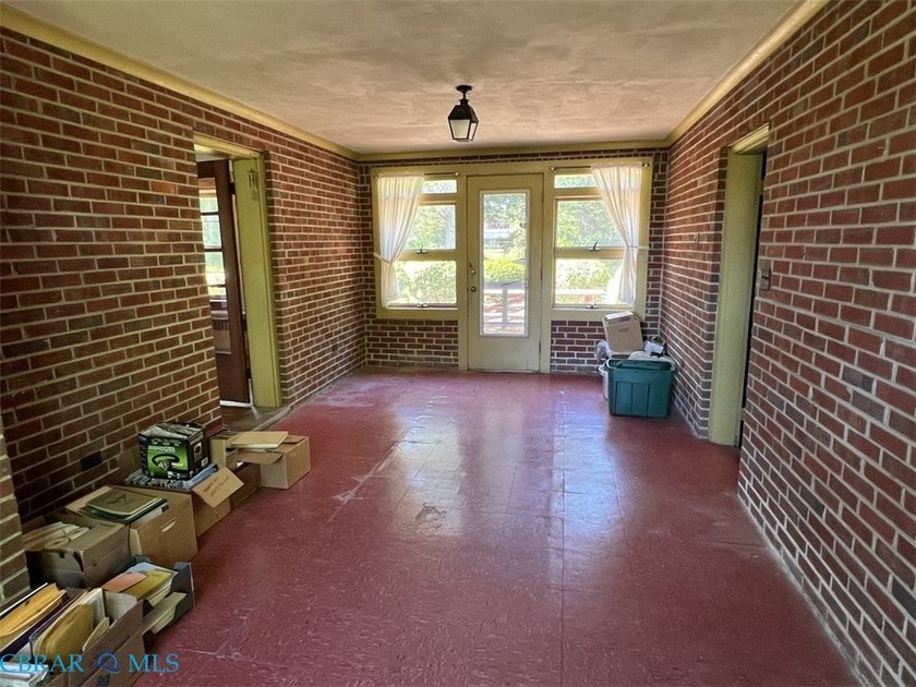 Classic Urbanna brick rancher located just a short walk away - photo 11
