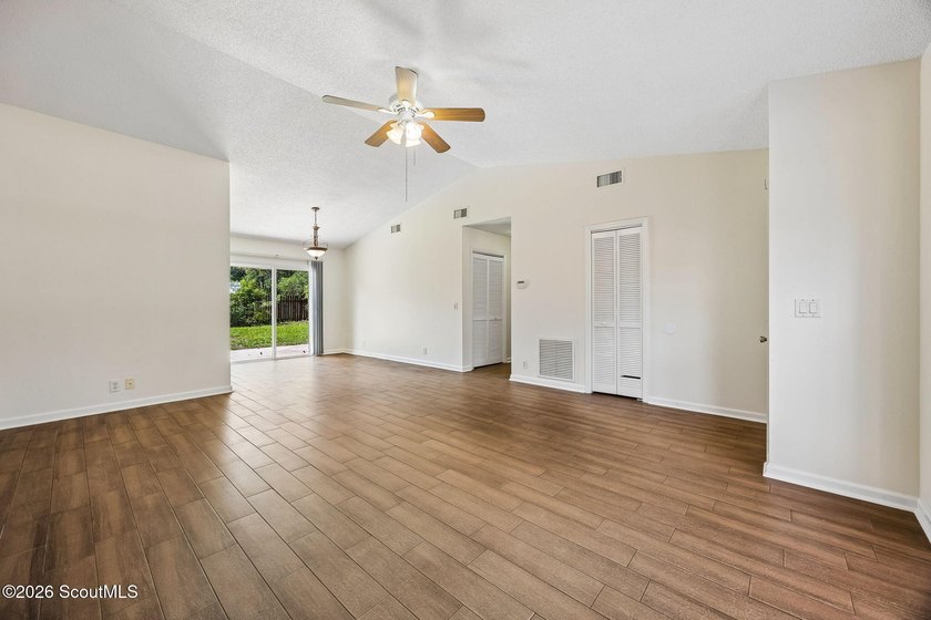 Ready for a quick move-in! This home offers tiled flooring - photo 11