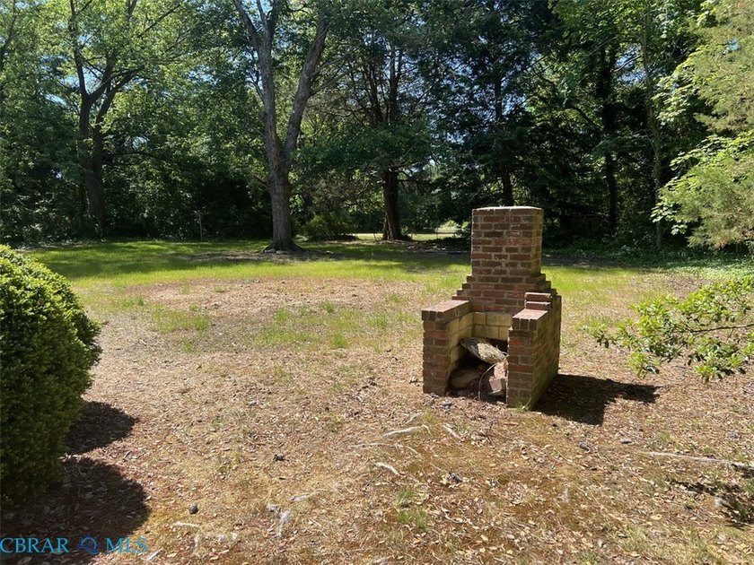 Classic Urbanna brick rancher located just a short walk away - photo 12