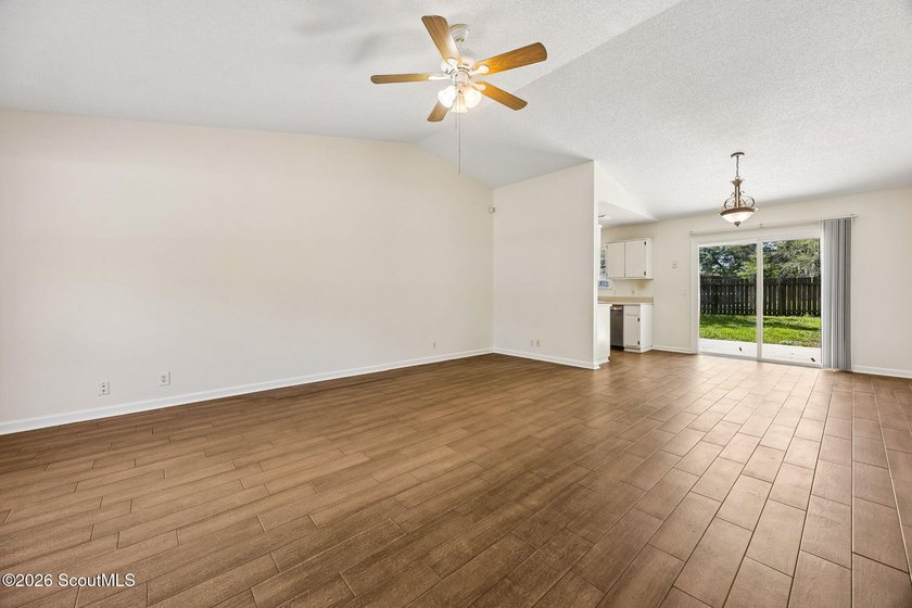 Ready for a quick move-in! This home offers tiled flooring - photo 12