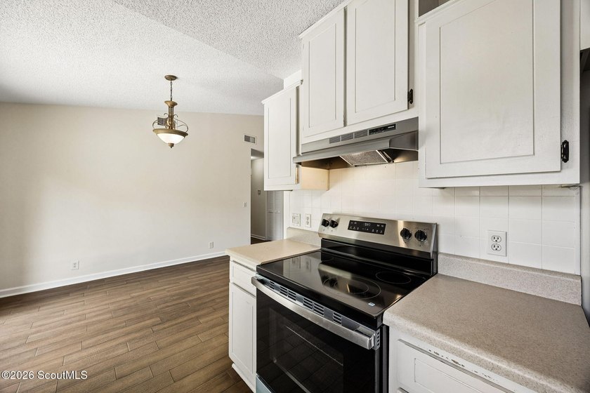 Ready for a quick move-in! This home offers tiled flooring - photo 19
