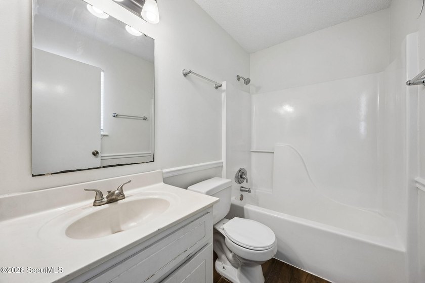 Ready for a quick move-in! This home offers tiled flooring - photo 24