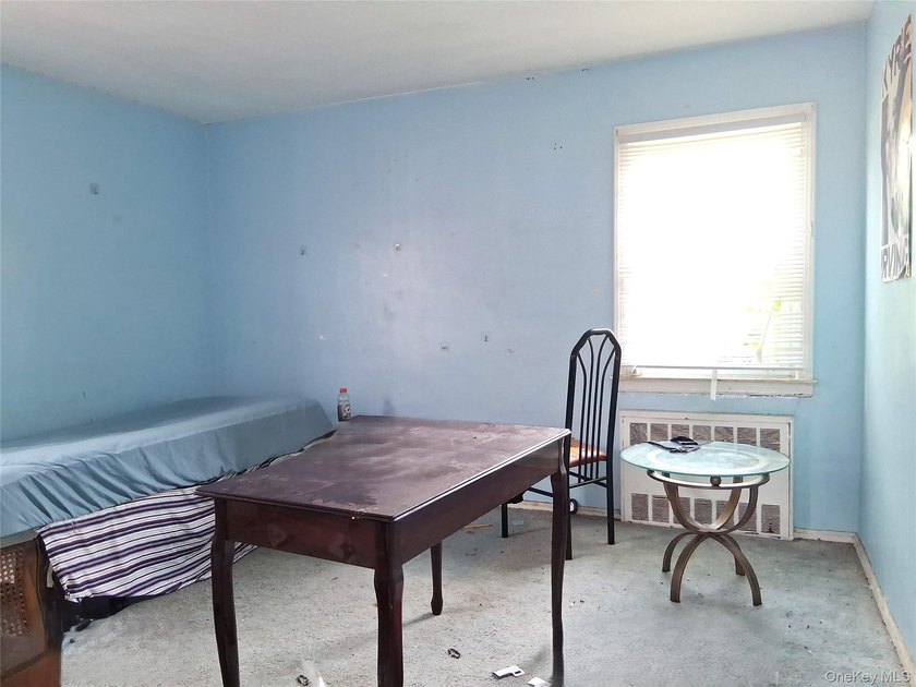 Spacious two-family home offering Two 3-bedroom, 1.5-bath units - photo 4
