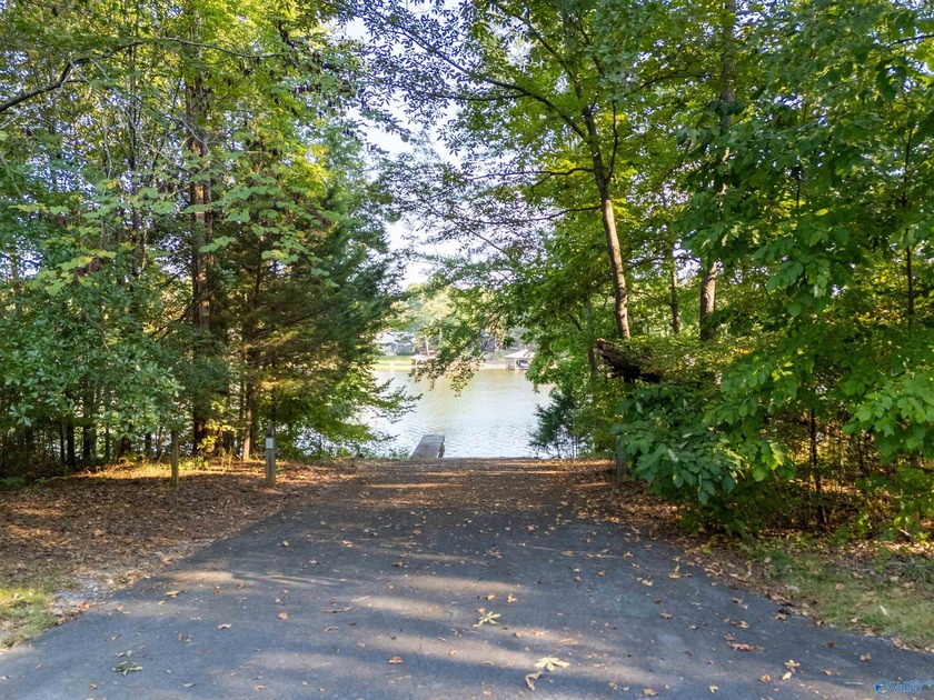 Lakefront living in a gated community on Weiss Lake! Just under - photo 7