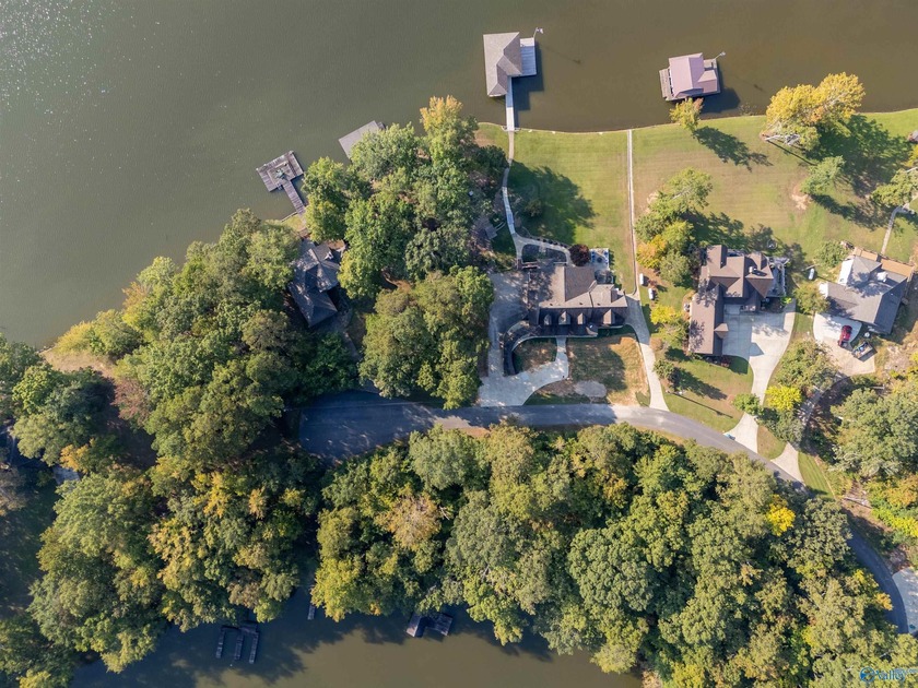 Lakefront living in a gated community on Weiss Lake! Just under - photo 8