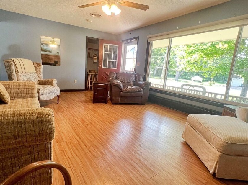 Located within walking distance of Schroon Lake village and the - photo 9