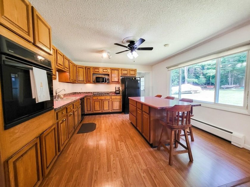 Located within walking distance of Schroon Lake village and the - photo 10