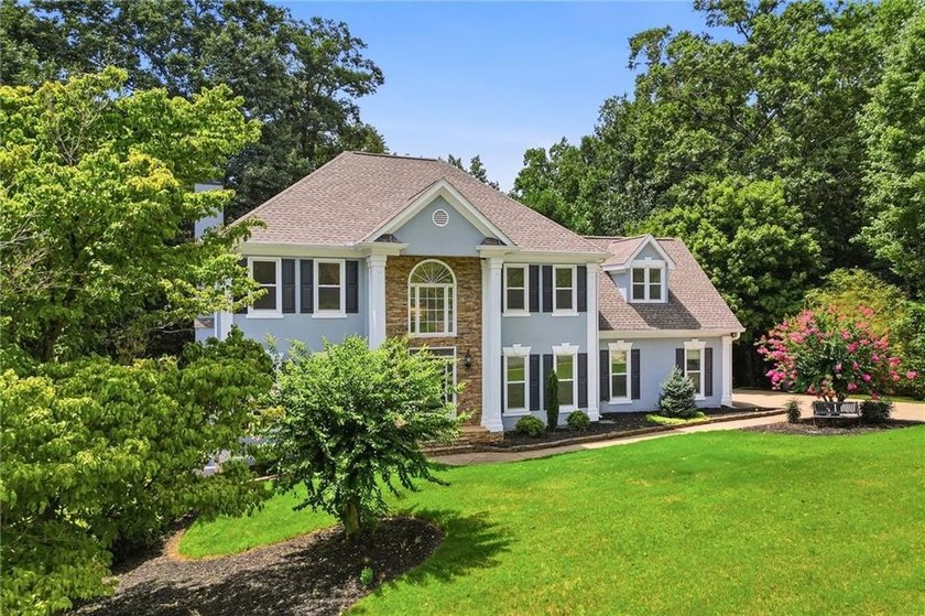 Welcome to this exceptional move-in ready home located in one of - photo 3