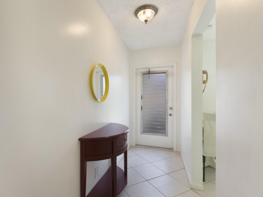 Enjoy easy Florida living in this beautifully maintained and - photo 5