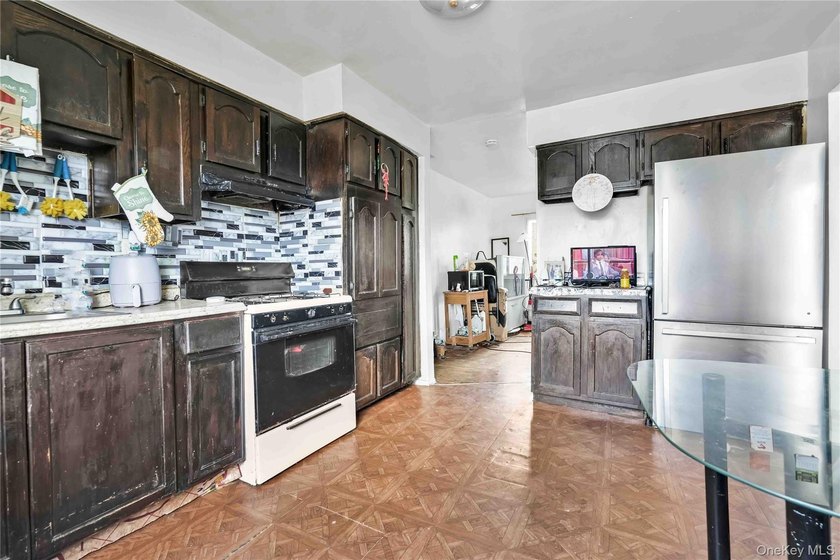 Welcome to 115-36 157th Street, a spacious two-family home in - photo 9