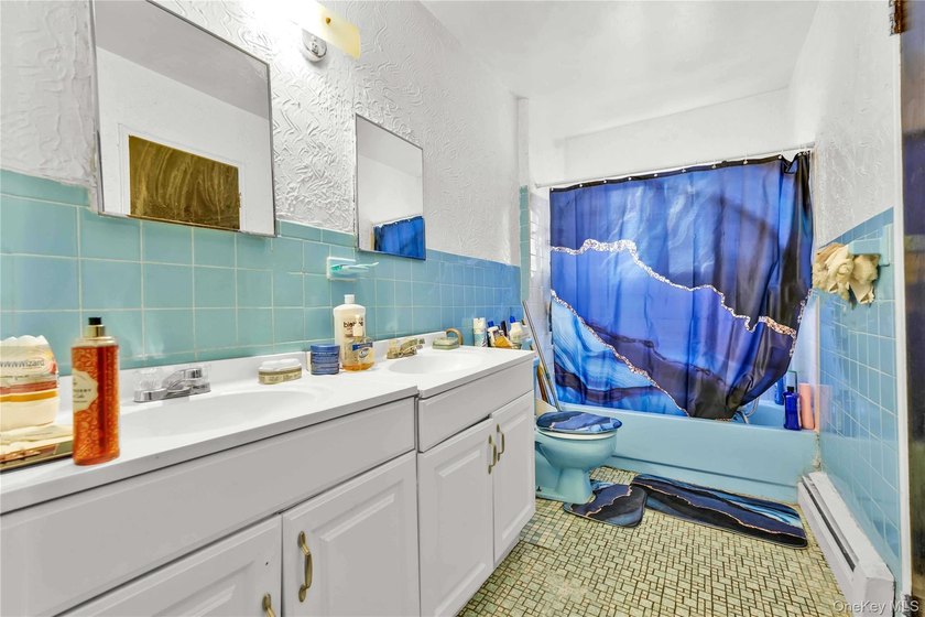Welcome to 115-36 157th Street, a spacious two-family home in - photo 10