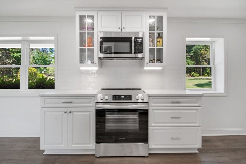 This Lake Home is truly a rare gem! Nestled along 165 Feet of - photo 19