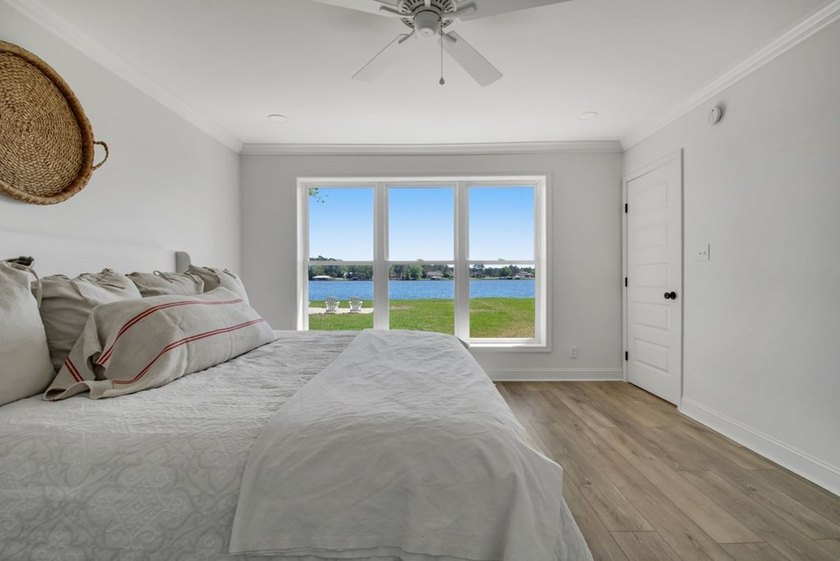 This Lake Home is truly a rare gem! Nestled along 165 Feet of - photo 33