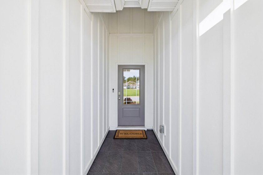 Located on a builder-designated premium lot in the more private - photo 5