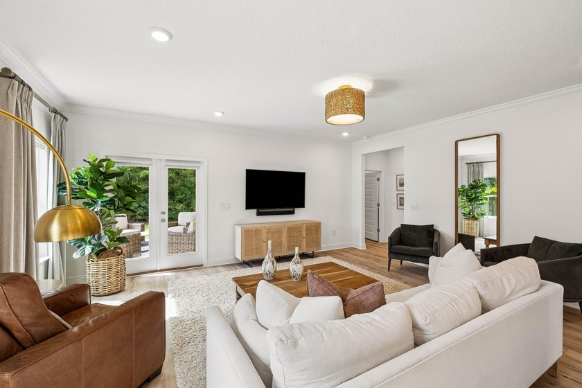 Located on a builder-designated premium lot in the more private - photo 6