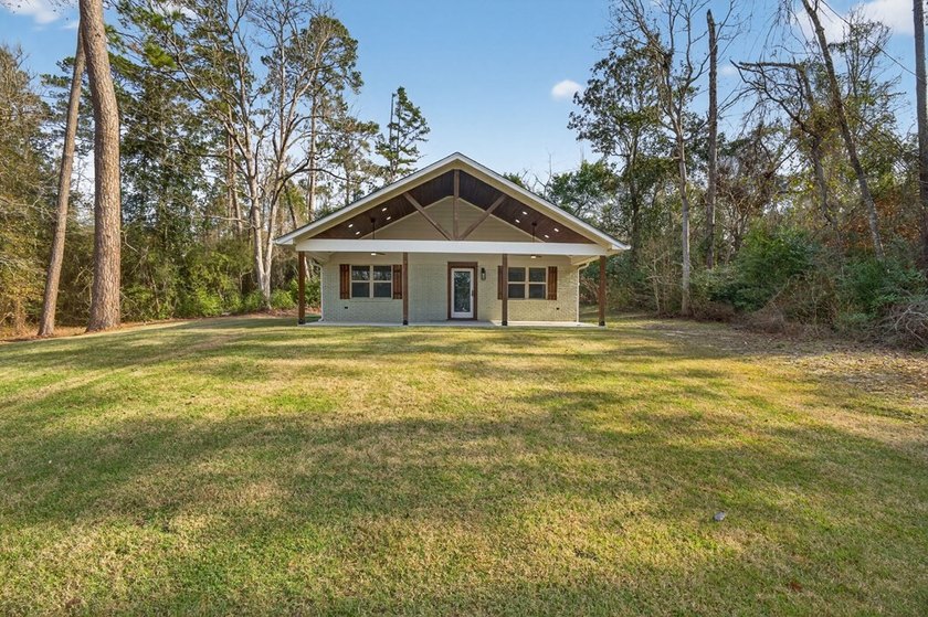 Completely gutted and remodeled down to the studs, this stunning - photo 4