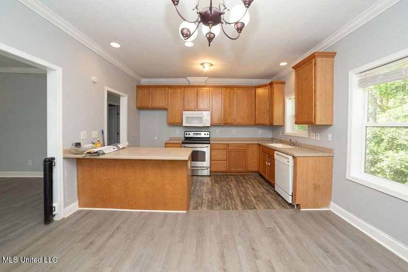 Charming 3-Bedroom Home in Waveland Lot goes street to street - photo 3