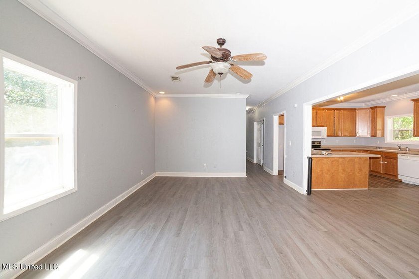 Charming 3-Bedroom Home in Waveland Lot goes street to street - photo 10