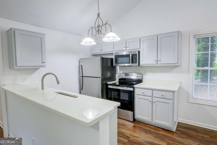 MUST SEE THIS CUTE RENOVATED BRICK RANCH HOME WITH FULL BASEMENT - photo 10