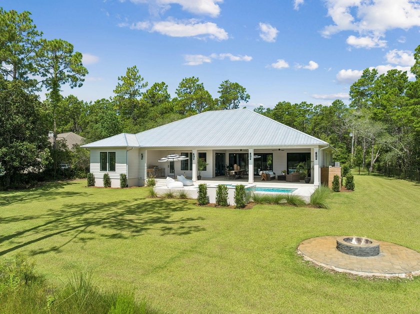 Welcome home to waterfront living on Eden Drive. This brand new - photo 5