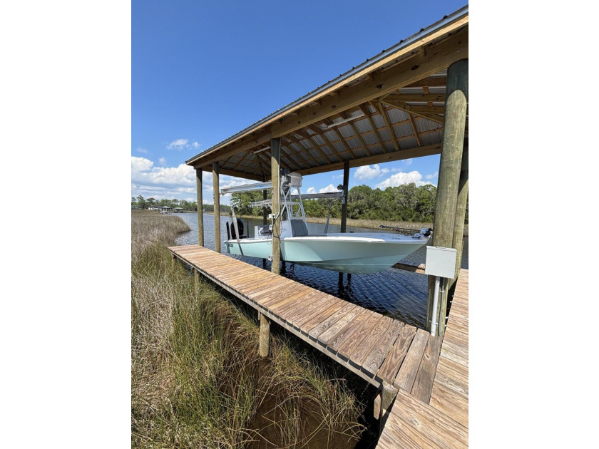 Welcome home to waterfront living on Eden Drive. This brand new - photo 6