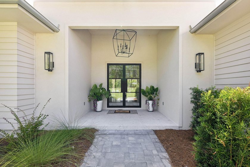 Welcome home to waterfront living on Eden Drive. This brand new - photo 7
