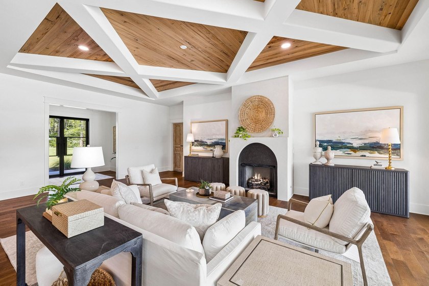Welcome home to waterfront living on Eden Drive. This brand new - photo 9