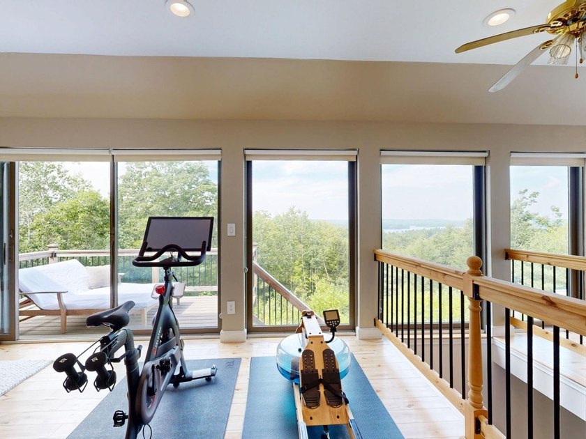 A must see! Perched above Damariscotta Lake, this 4-bedroom - photo 8