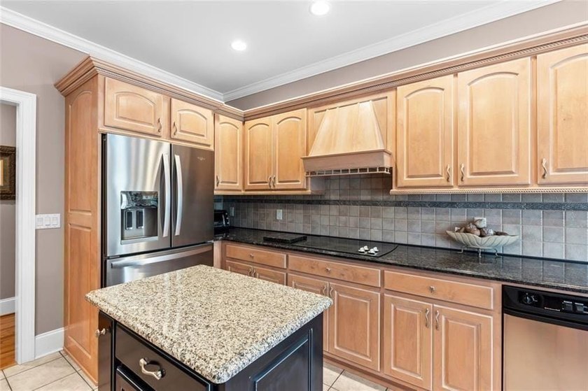 This exquisite four-sided blush brick estate is the epitome of - photo 22