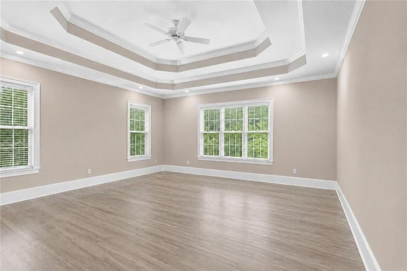 This exquisite four-sided blush brick estate is the epitome of - photo 24