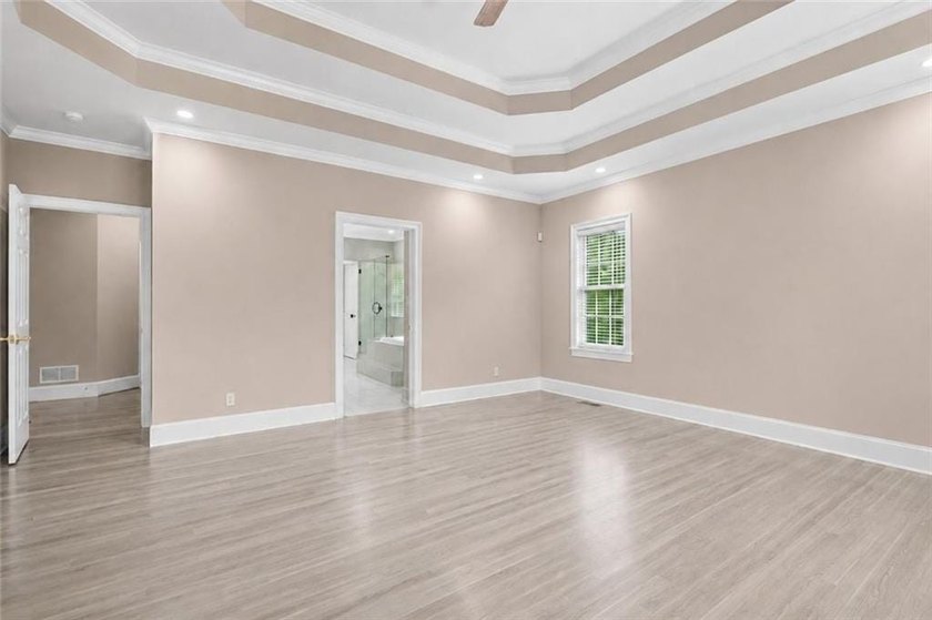 This exquisite four-sided blush brick estate is the epitome of - photo 26