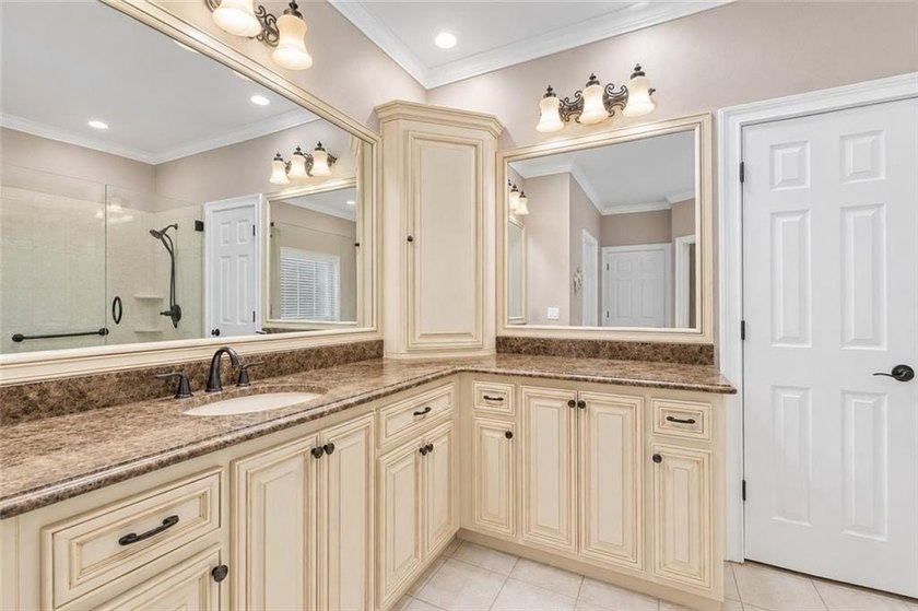 This exquisite four-sided blush brick estate is the epitome of - photo 29