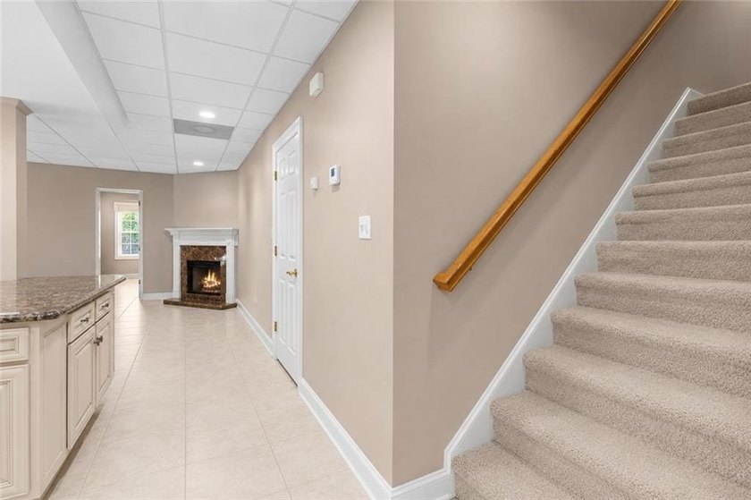 This exquisite four-sided blush brick estate is the epitome of - photo 38