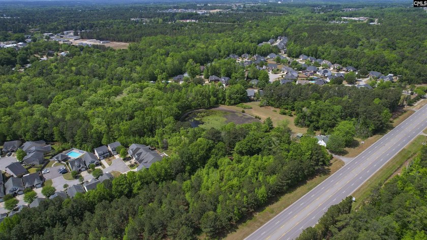 +/-21.83 acres with approximately 575 feet of road frontage on - photo 41