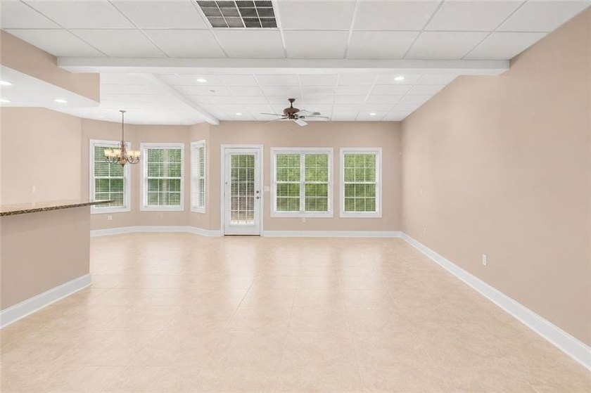 This exquisite four-sided blush brick estate is the epitome of - photo 43